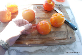 peeling peaches after boiling them, then dropping into an ice bath
