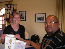 Exchanging Banners with Mbabane Club President