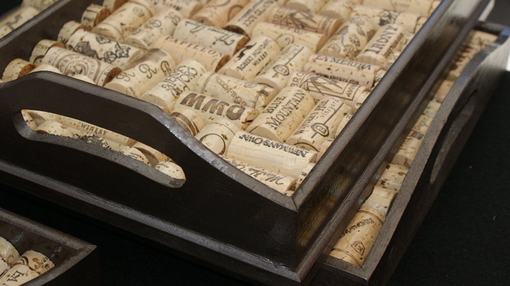 Joe uses spent corks to craft handmade coasters and serving trays Joe uses spent corks to craft handmade coasters and serving trays