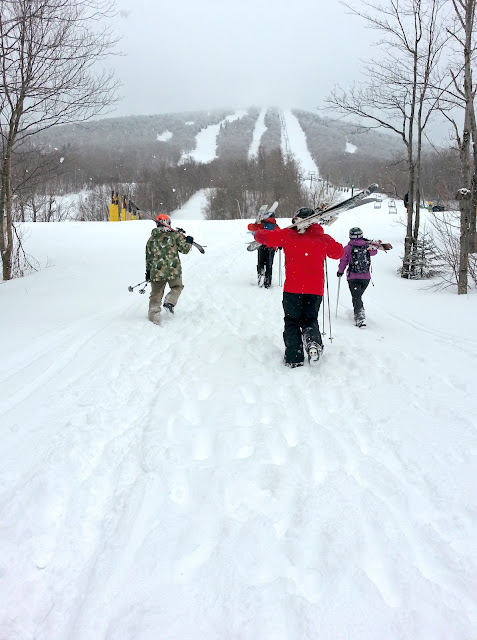 Skiers hike to Jay Peak, Vermont
