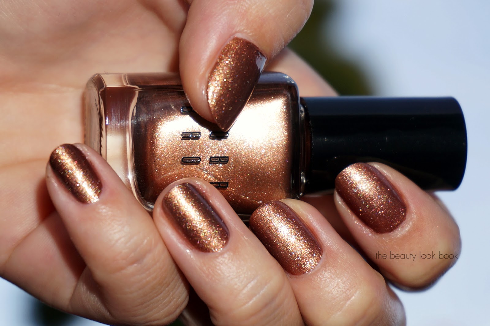 10. Shimmery Bronze Nail Polish - wide 8