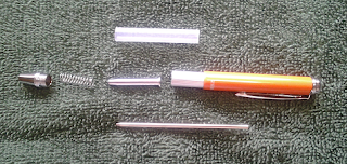Zebra pen broken and in pieces. Photo: Zebra pen broken in pieces.