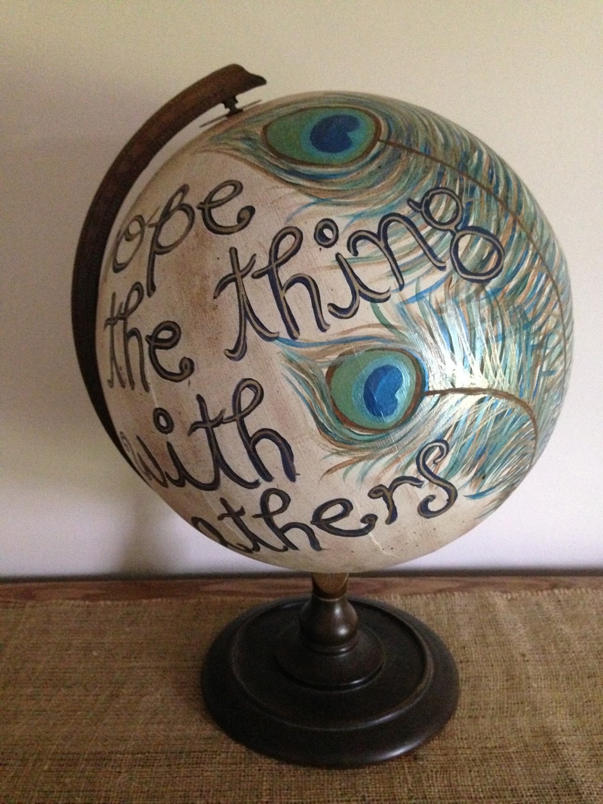 The Peacock Fairy Decorating with Globes