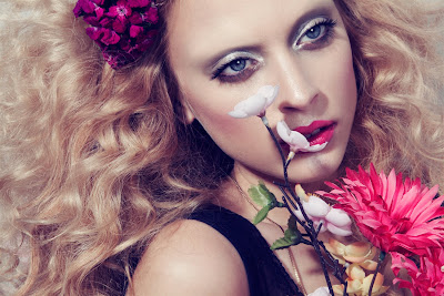 vesna parcina model, woman holding flowers, woman smelling flowers