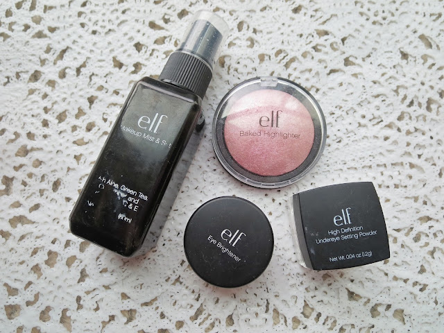 a picture of e.l.f. Studio Makeup Mist & Set, Studio Baked Highlighter in Pink Diamonds, Mineral Eye Brightener in Buff, Studio High Definition Undereye Setting Powder in Sheer