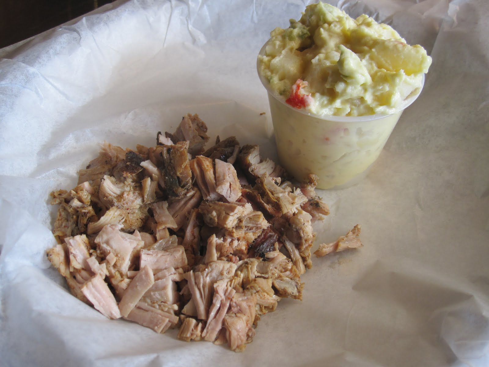 Man Up Tales of Texas BBQ™ Pulled pork & potato salad at Brothers BBQ