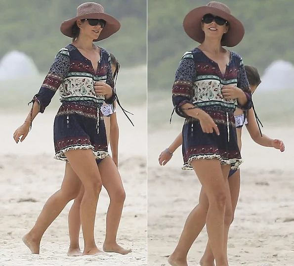 Crown Princess Mary of Denmark hits the beach again in Byron Bay. Walking barefoot along the sand she was accompanied by eight-year-old daughter Princess Isabella