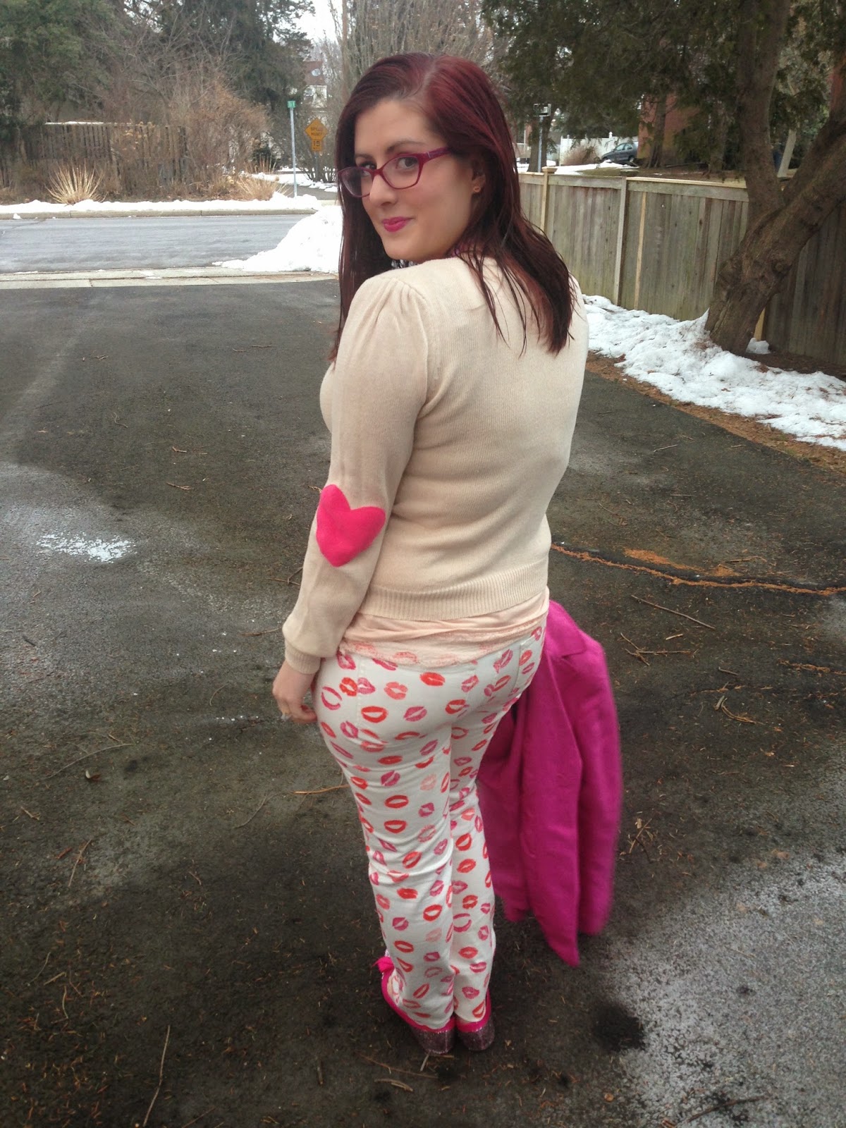 behind the leopard glasses Day 12 lip stick print pants