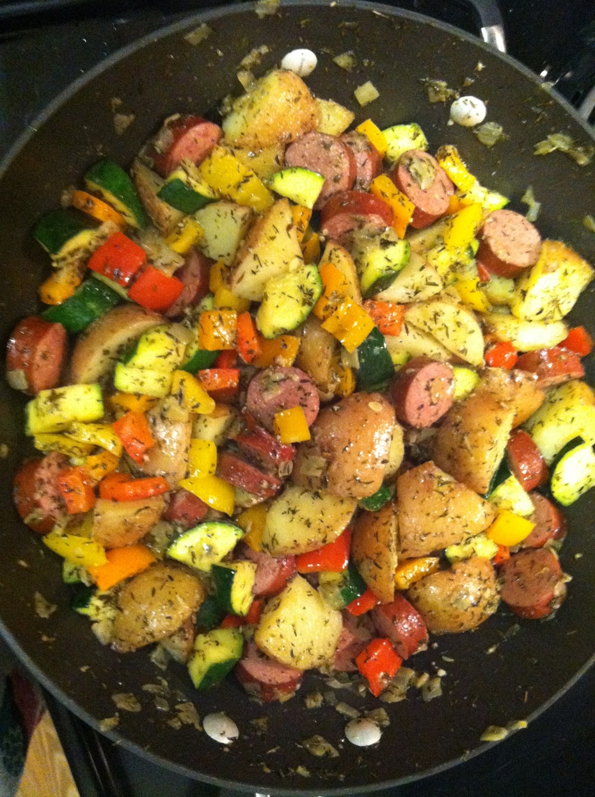 Footeprints Good Eats Summer veggies, turkey sausage, and potatoes.