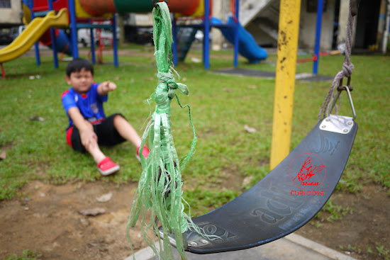 Yaasir on the broken swing