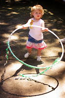 toddler with a hula hoop on Welcoming Sunday