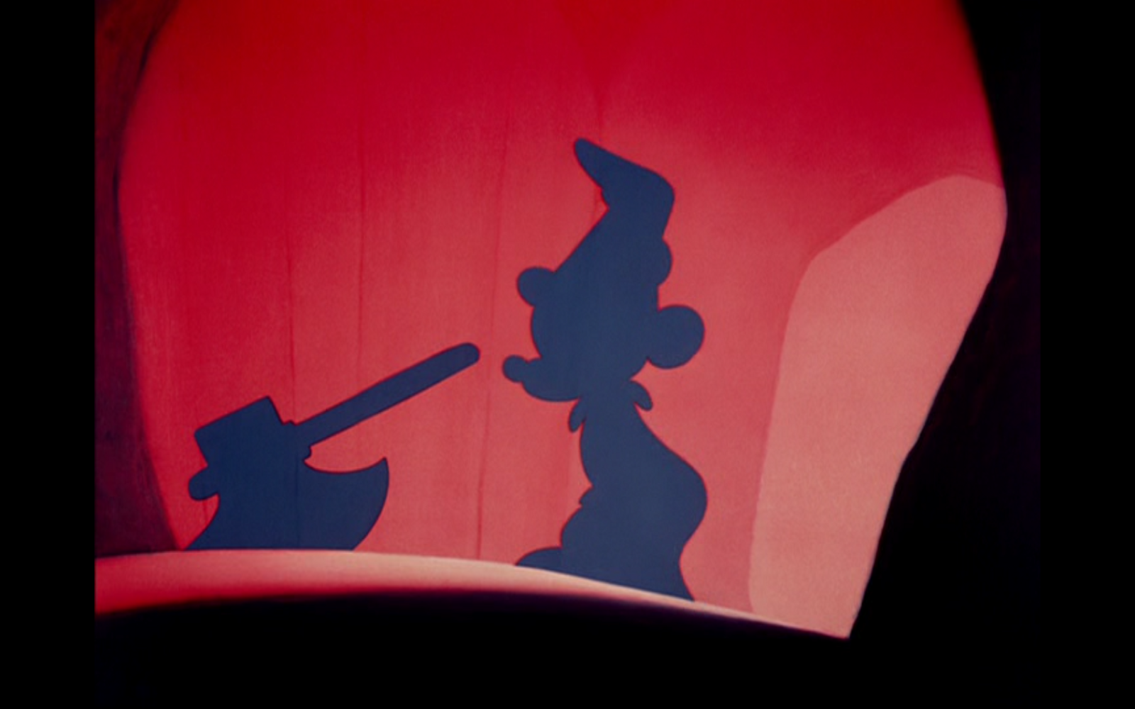 Using light, shadow, and color, Disney animators showed Mickey Mouse killing his own creation with an axe in "The Sorcerer's Apprentice" (Disney)