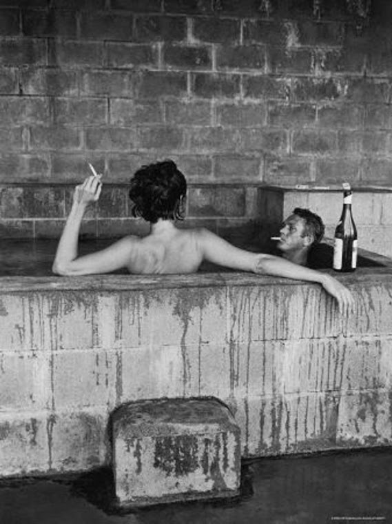 Steve McQueen and wife taking sulfur bath at home.