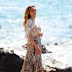 Elizabeth Olsen looks like an Egyptian goddess in ethereal flowing dress as she poses for beach photoshoot in Malibu