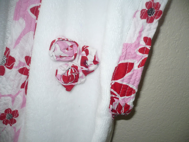 rosette embellishment on bathing robe