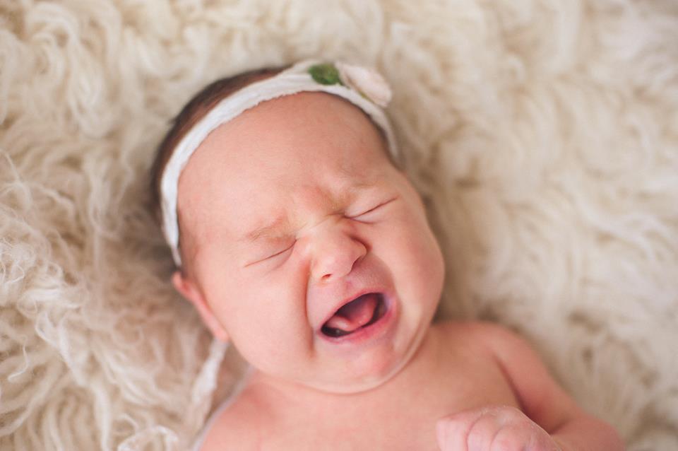 reasons baby fussy at breast