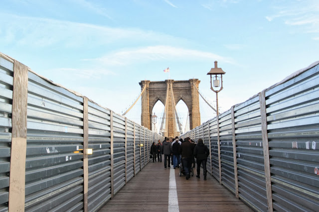 The view of Brooklyn Bridge from the pedestrian walkway in New York, USA The view of Brooklyn Bridge from the pedestrian walkway in New York, USA