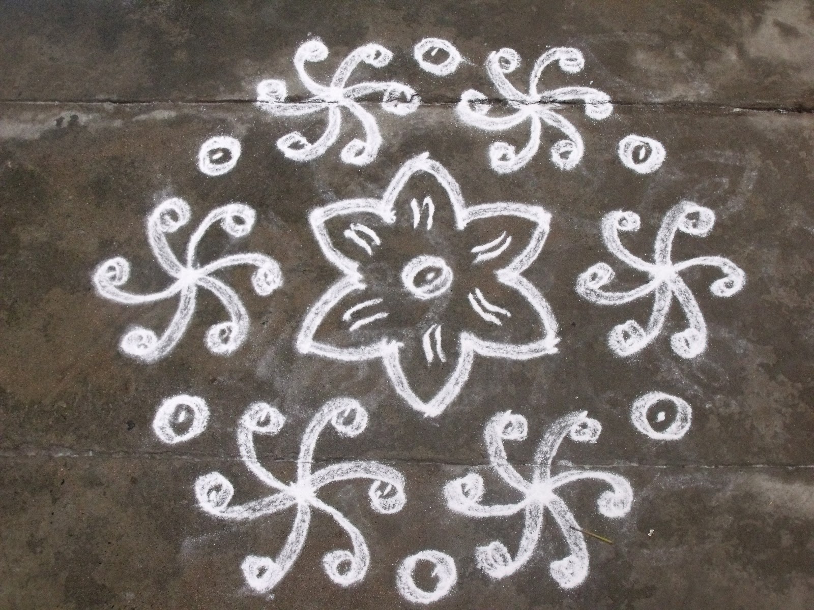 Rangoli designs/Kolam: 9-5 pulli kolam - interlaced dots kolam