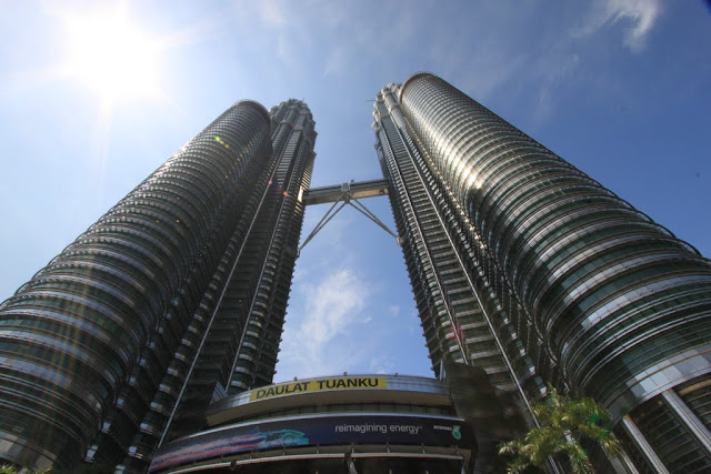 A close-up view of Petronas Twin Towers which is known as one of the world's tallest buildings in Kuala Lumpur, Malaysia A close-up view of Petronas Twin Towers which is known as one of the world's tallest buildings in Kuala Lumpur, Malaysia