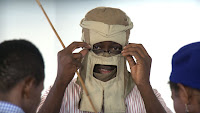 Bisade Ologunde alias Lagbaja shows face 