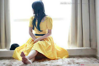 yellow-dress-alone-girl-sitting-beside-the-window-sad-cute