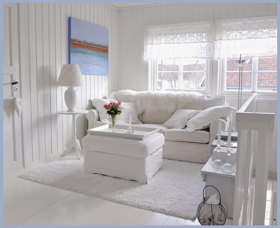 living room with all white furniture