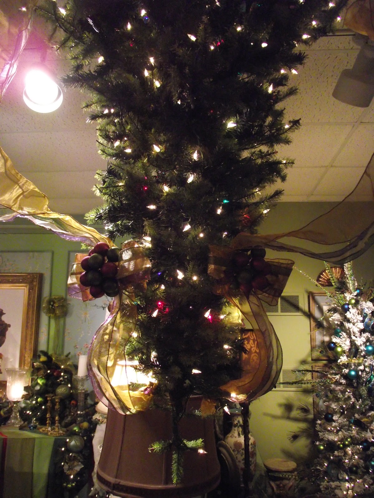 Decorating an Upside Down Christmas Tree in purple olive and gold