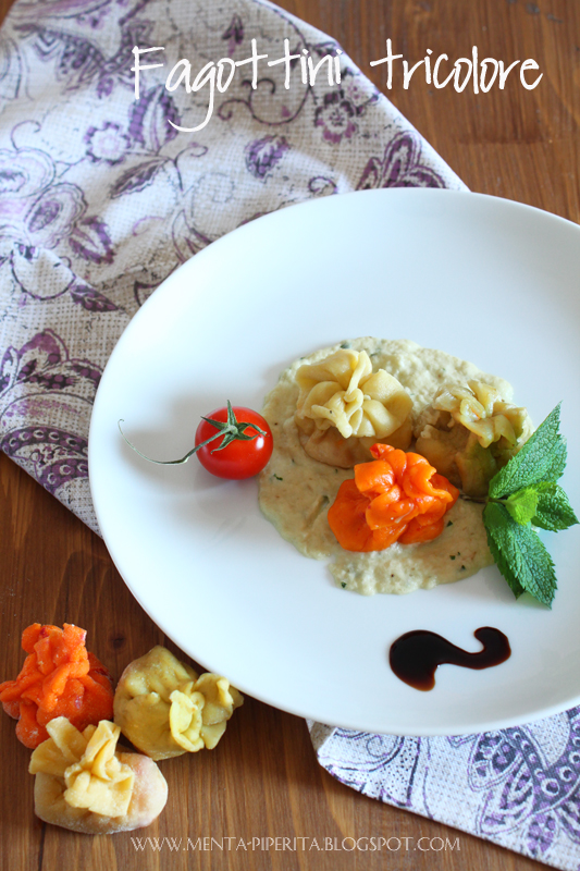 Fagottini tricolore alla fontina e pachino caramellati su mousse di melanzane e menta