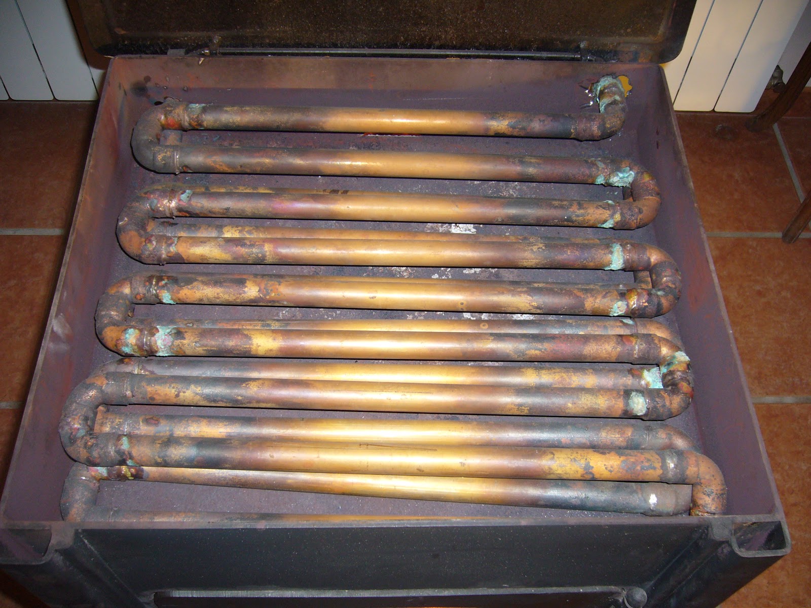 Programando voy, programando vengo.: Estufa de leña conectada a la