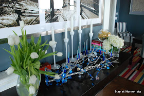 Hanukkah tablescape with menorah and candles