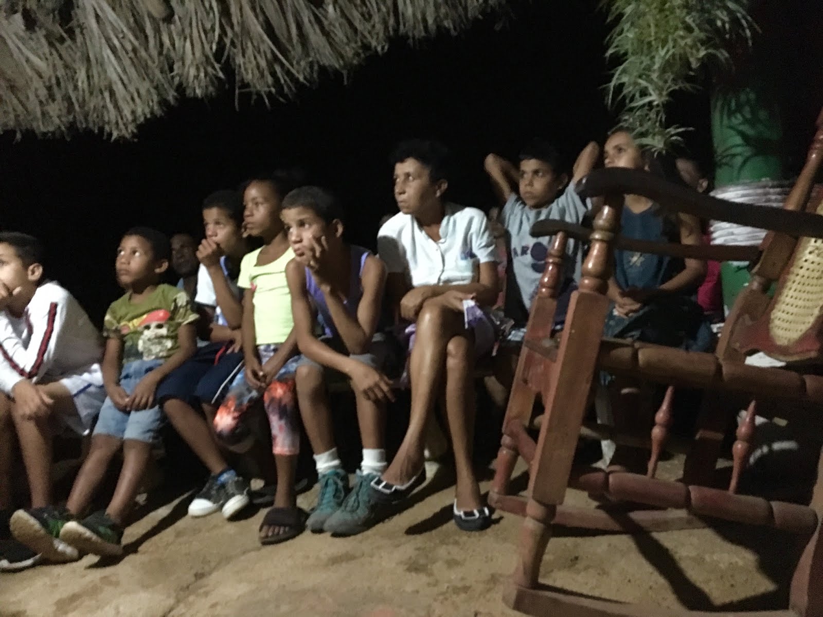 Children in Cuba listening to Jubilee's violin