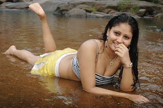 Amrutha Valli wet showing cleavage navel and milky thighs7