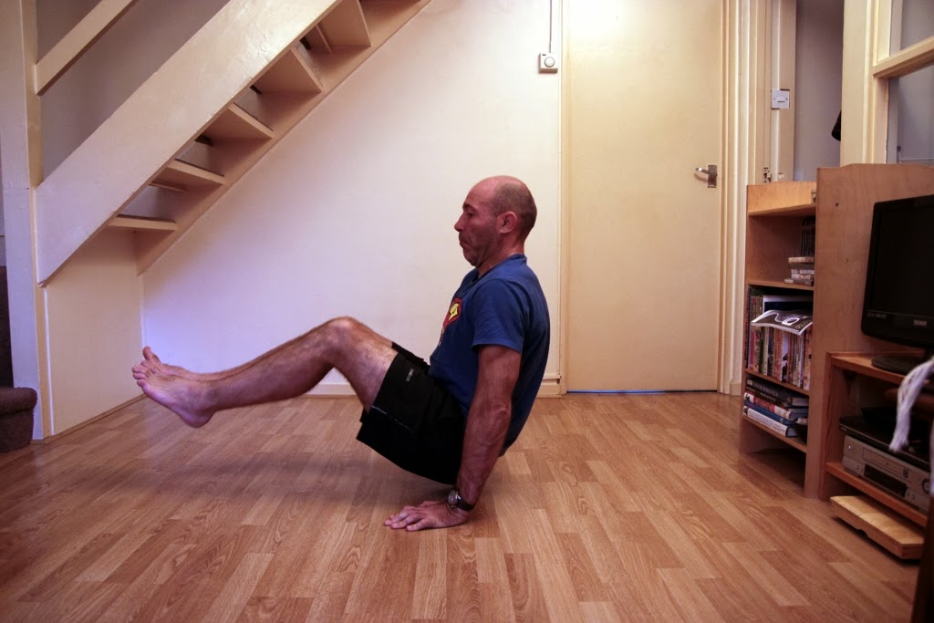 Floor L Sit Tuck exercise 
