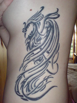 phenix tattoo. Girl with Phoenix Tattoo