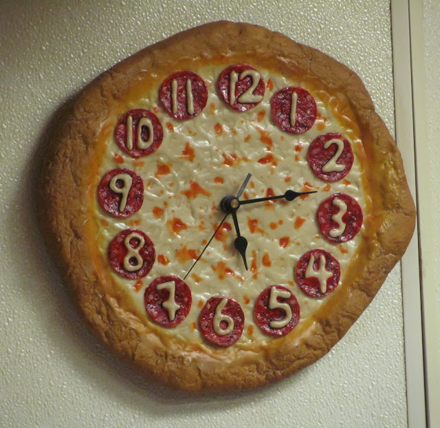 Lensing and Shuttering Pizza Clock at Monicals