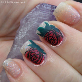 Romantic and sparkly nail art featuring roses and diamond glitter, matted.