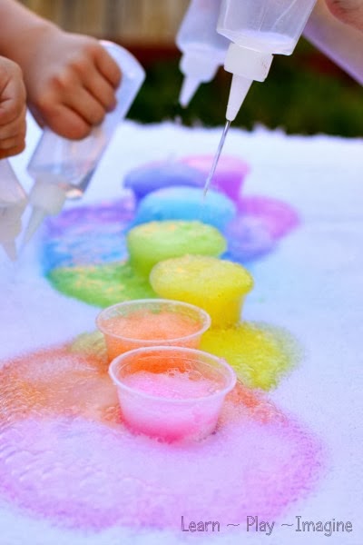 Make beautiful rainbow eruptions with baking soda and vinegar - exciting for kids and grown ups alike!