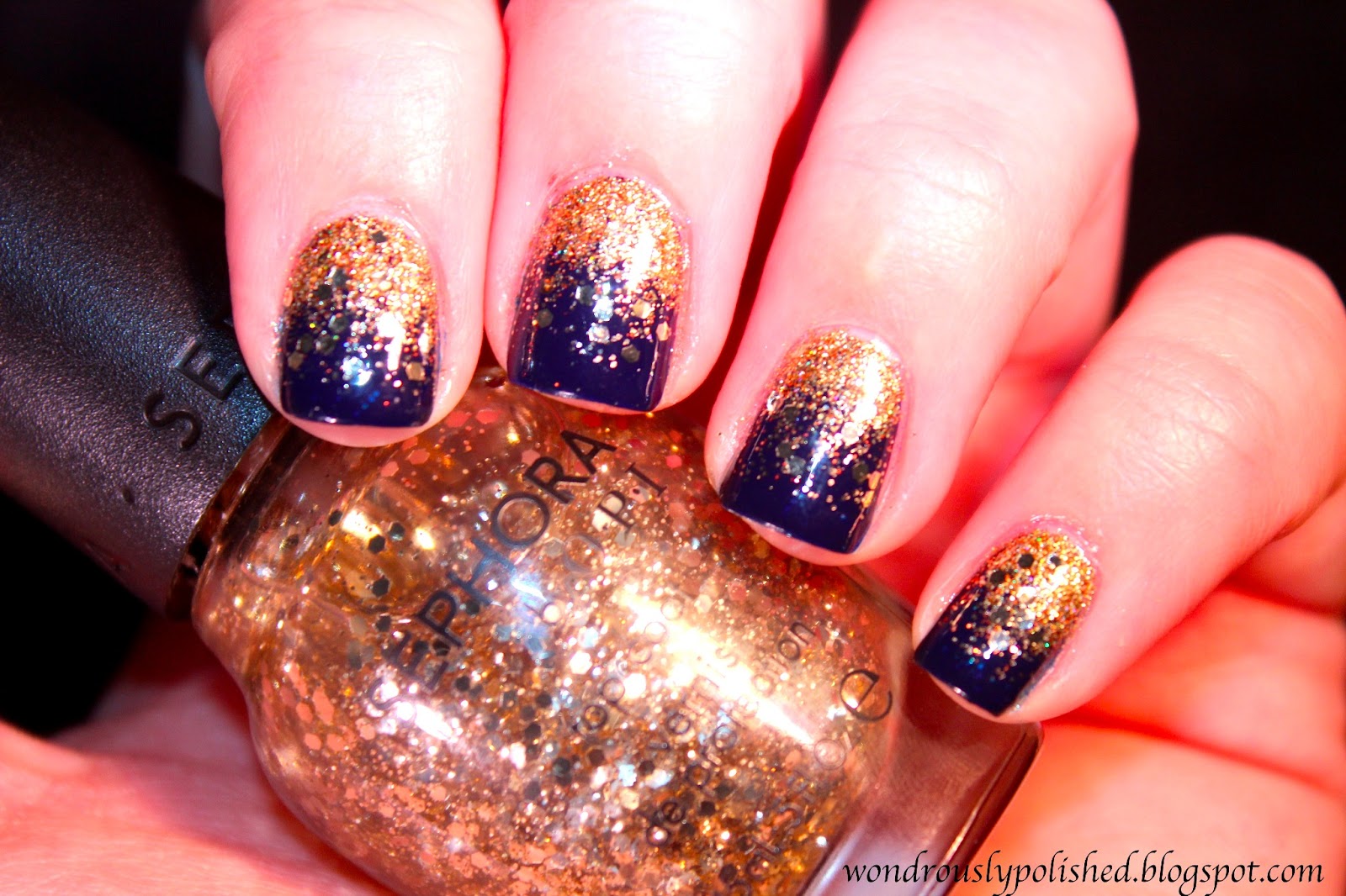 4. Dark Blue and Gold Glitter Gradient Nail Design for Winter - wide 10
