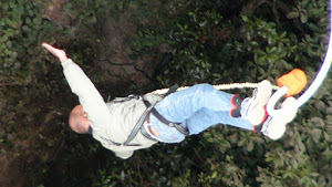 Floating on a "Bungy Chord" after a 160 meters jump .