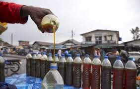 Emmanuel Udom: The booming roadside engine oil business in Lagos