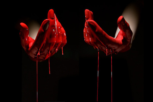 hands in blood