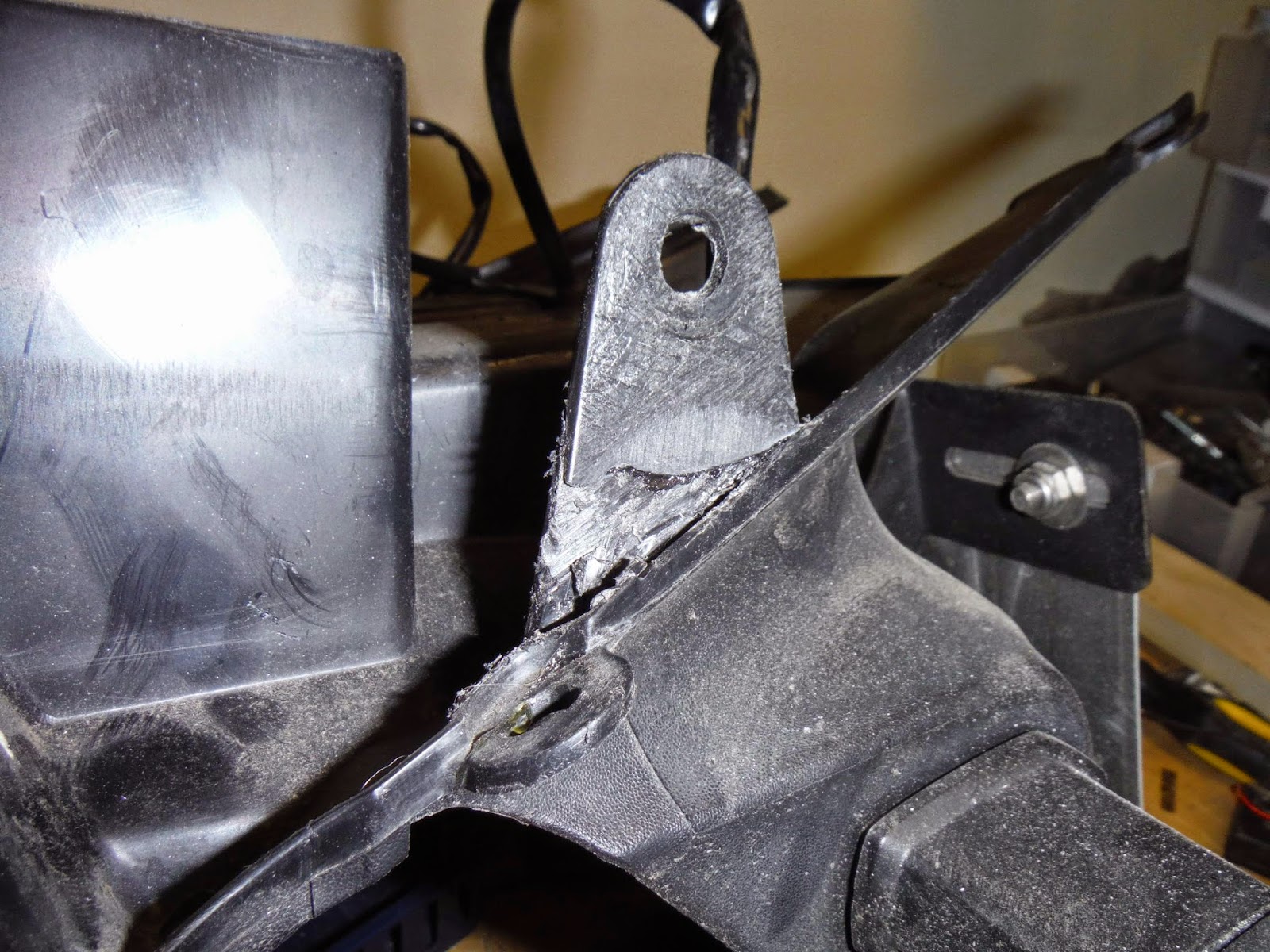 Henry Martin Motorcycles Fixing broken tabs with fiberglass