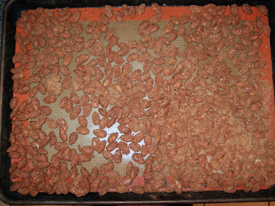Spiced nuts on baking sheet.