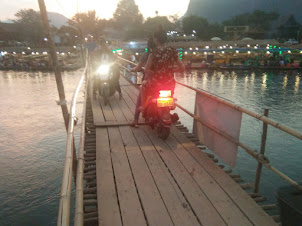 Wooden bridge across Nam Song river in Vang Vieng