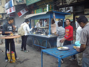 Typical street breakfast at Delhi's famous "Chandni Chowk".(Sunday 6-11-2011).