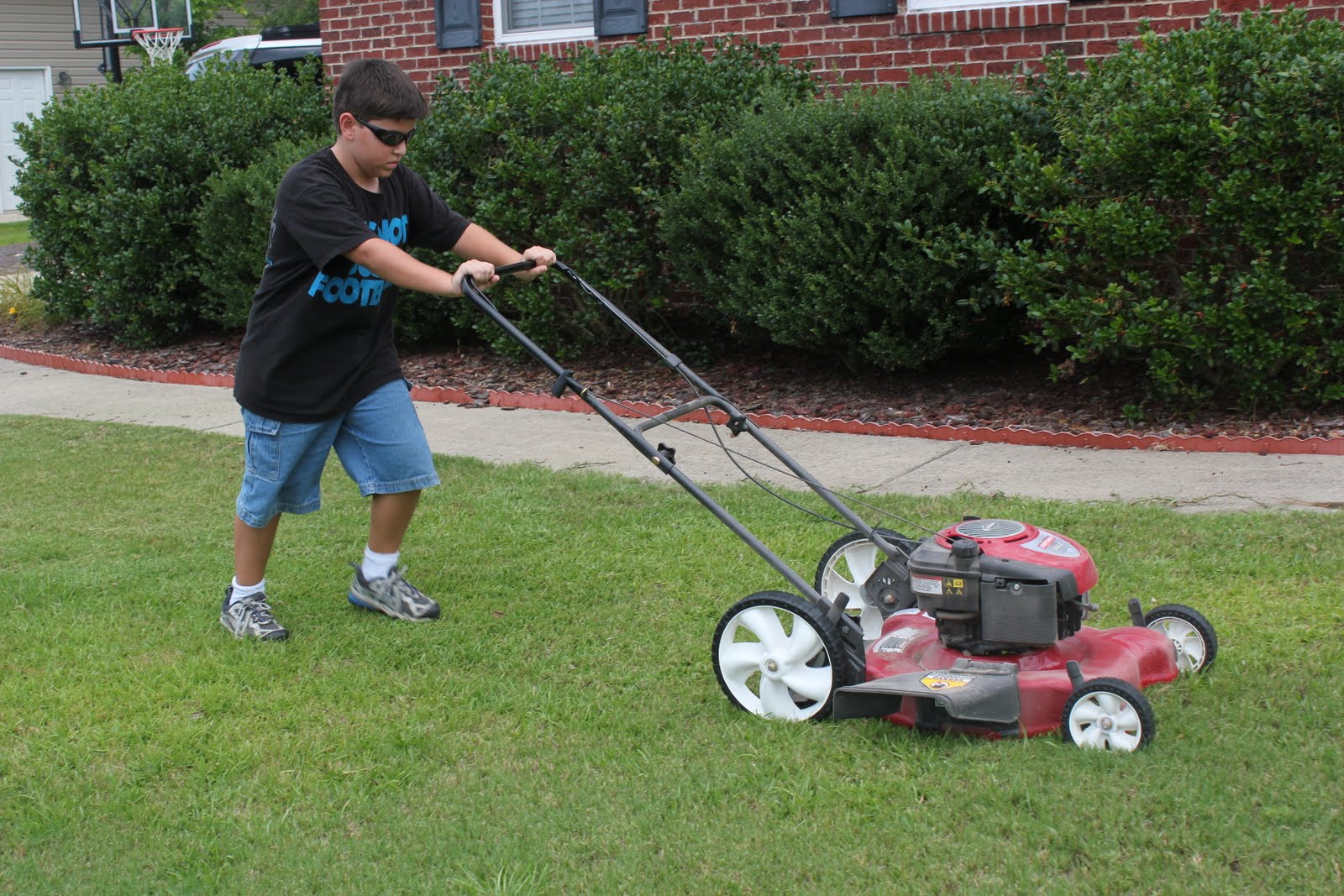 Taylor Happenings... Guess Who Learned to Cut the Grass!?!