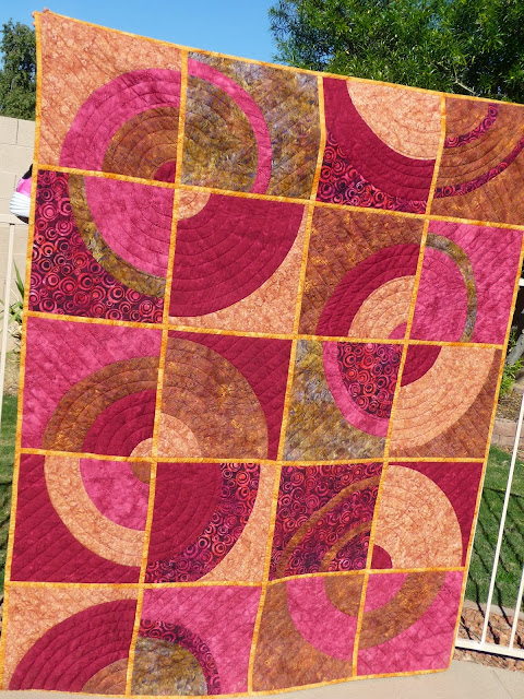 http://www.quiltparadigm.blogspot.com/2014/01/my-favorite-to-date-qayg.html