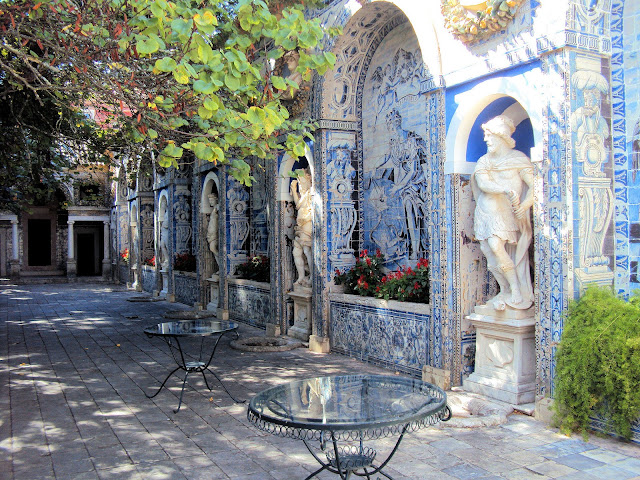 Chapel Terrace is filled with niches of mythological figures framed by tile-work panels of exuberant design.