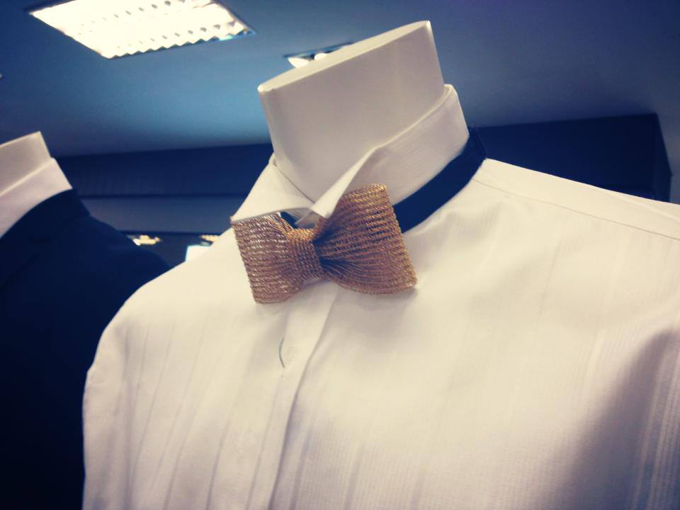 black tux with gold bow tie