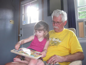 Laina (age 4) reads to grandpa